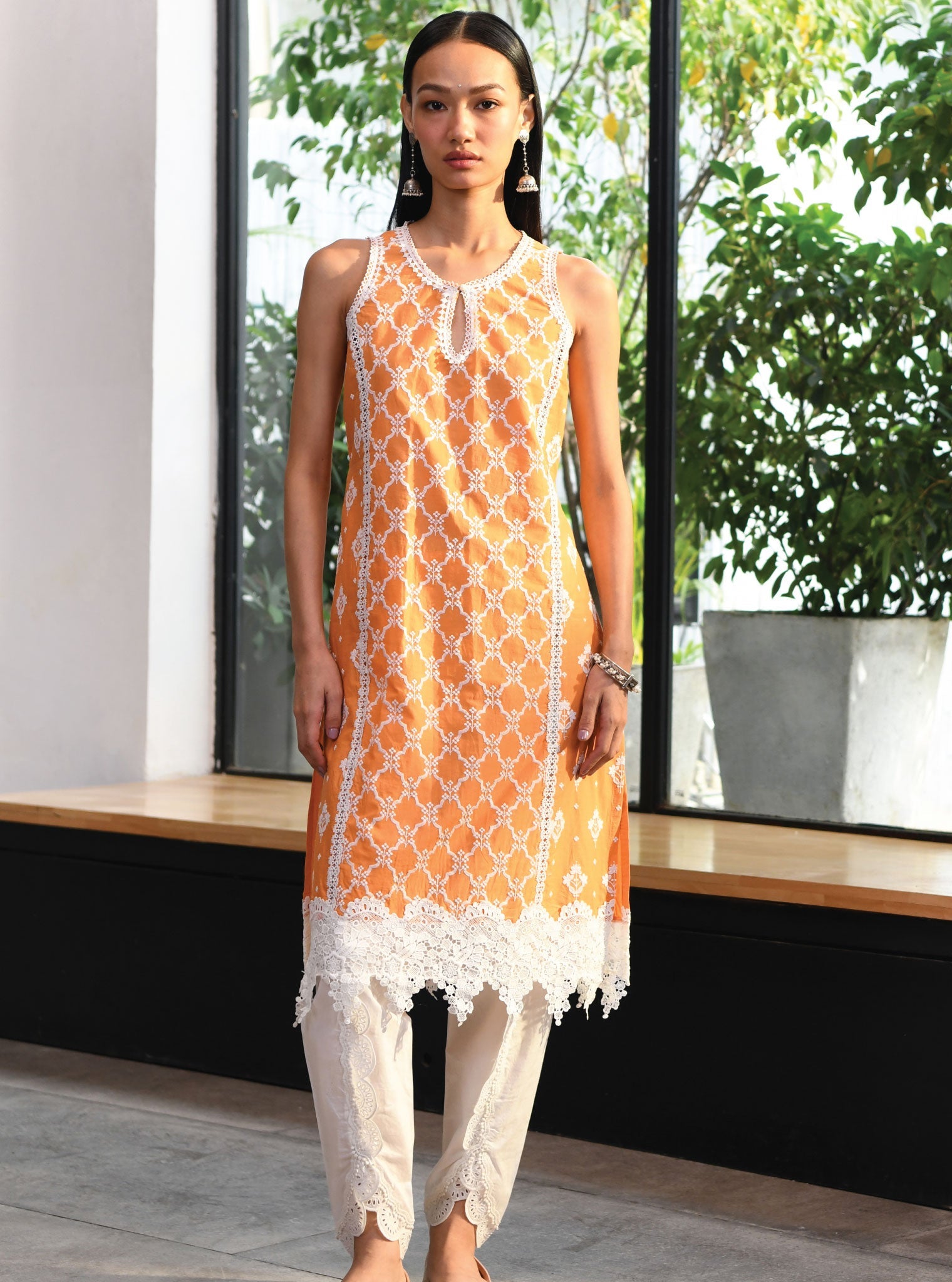 Mulmul Cotton Newry Orange Kurta With Border White Dhoti Pant